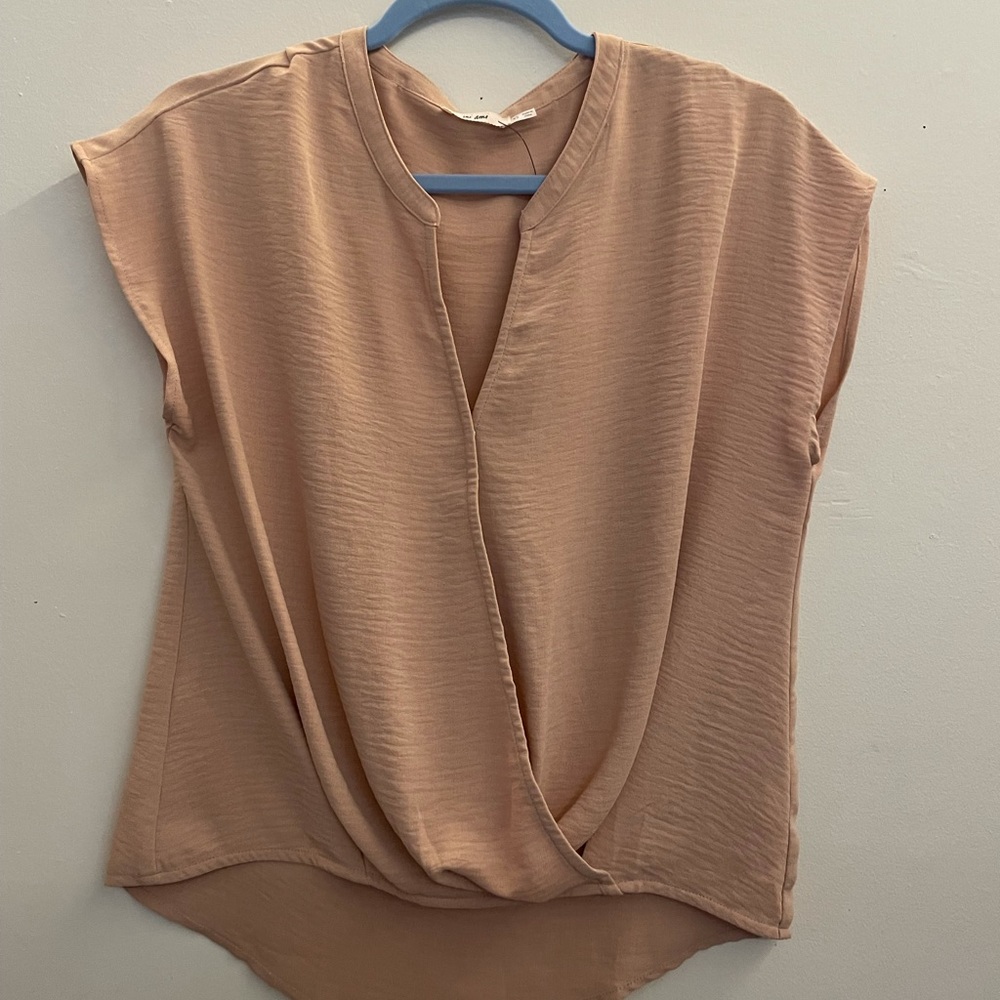 Francesca’s dress loose fitting shirt.